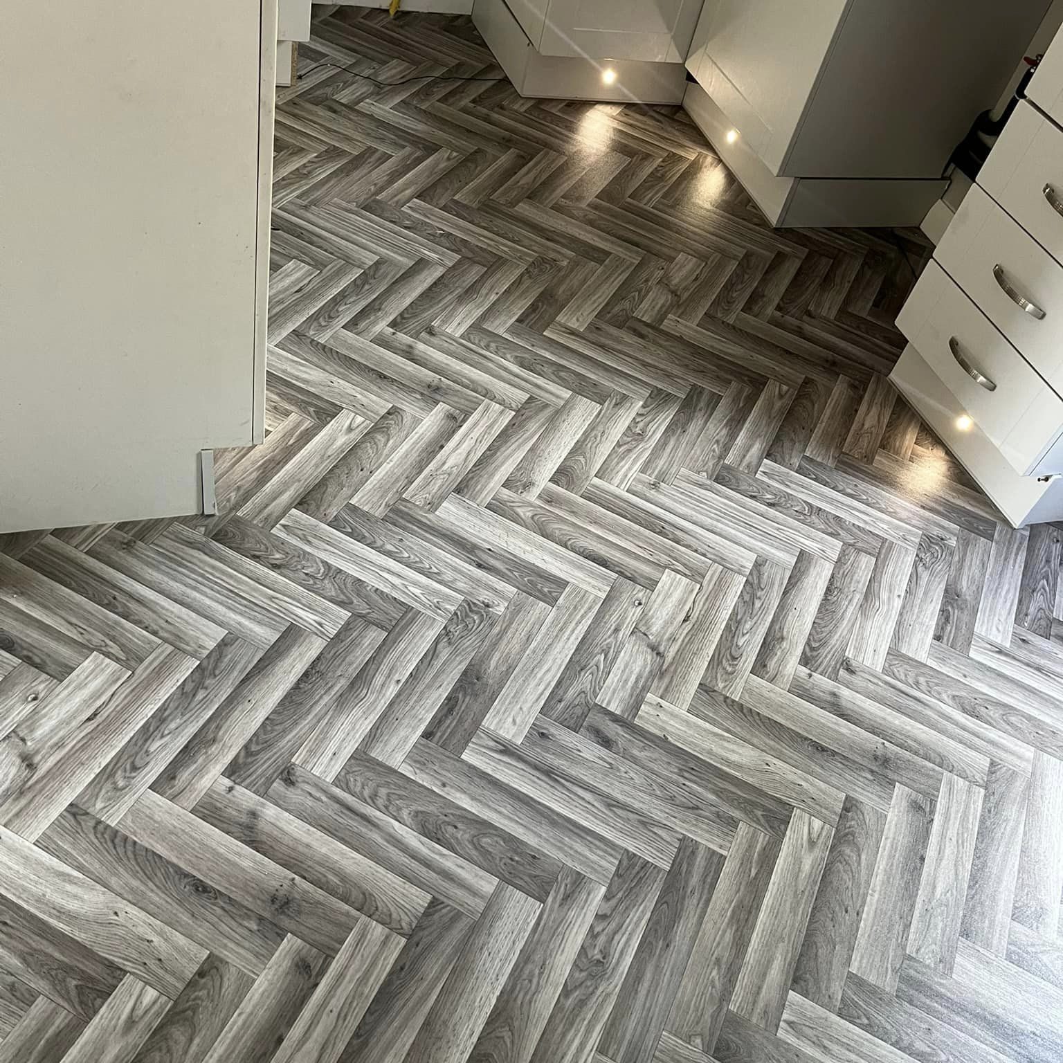 herringbone flooring in kitchen