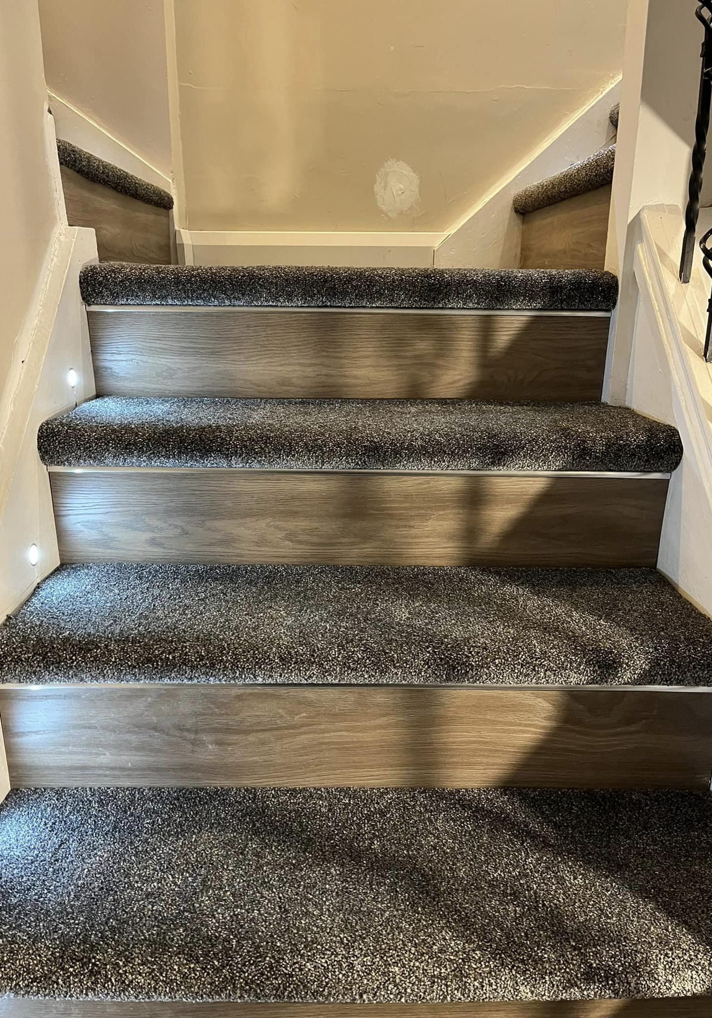 Carpet and wooden floor