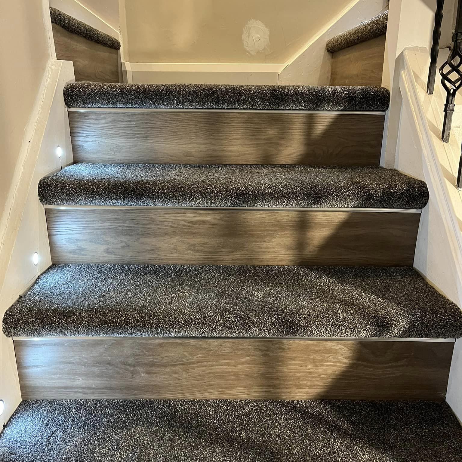 Carpet and wooden floor